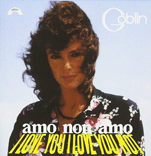 CD cover: woman with curly hair, text “amo non amo” and “I LOVE YOU I LOVE YOU NOT”.