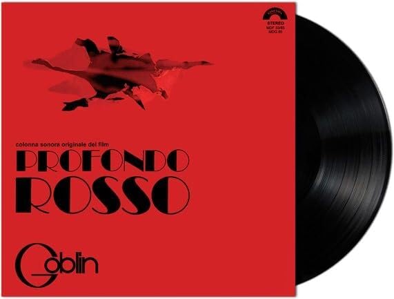 Red album cover with black splatter graphic and a black vinyl record.