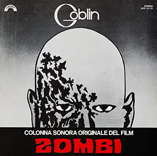 White vinyl record cover for Goblin’s “Zombi” with a stark, silhouetted face.
