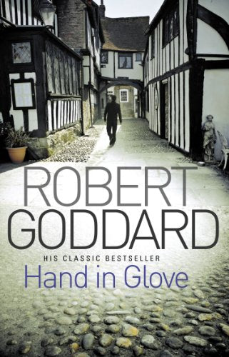 Book cover: cobblestone street scene with a figure walking away.