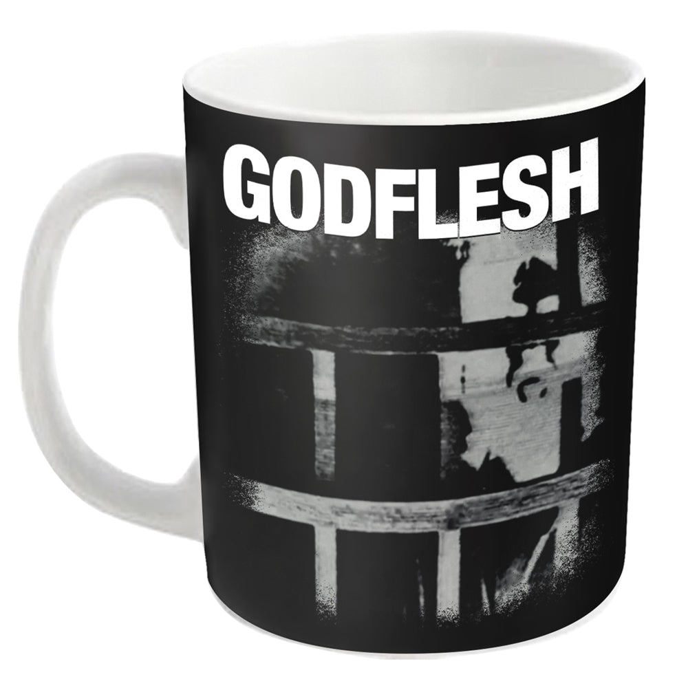 Black mug with white "Godflesh" band logo and industrial imagery.