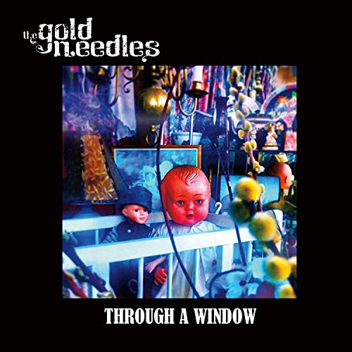 Album cover with dolls and surreal objects on a shelf, surrounded by dark background.