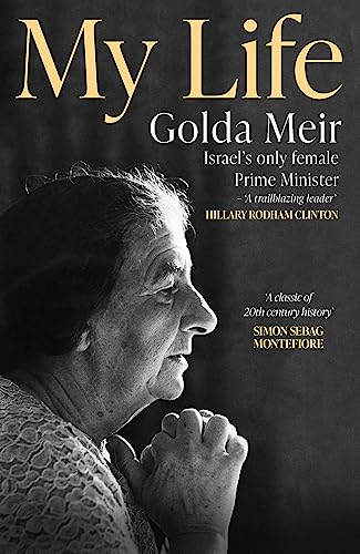 Black and white photo of Golda Meir with hands clasped, looking to the right.