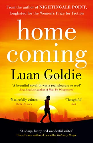 Book cover: "Homecoming" by Luan Goldie, silhouette walking towards city.