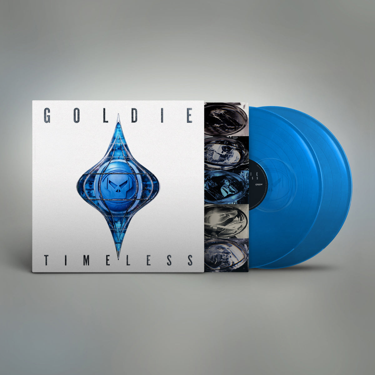 Blue vinyl record of Goldie’s “Timeless” album with jewel-shaped cover art.