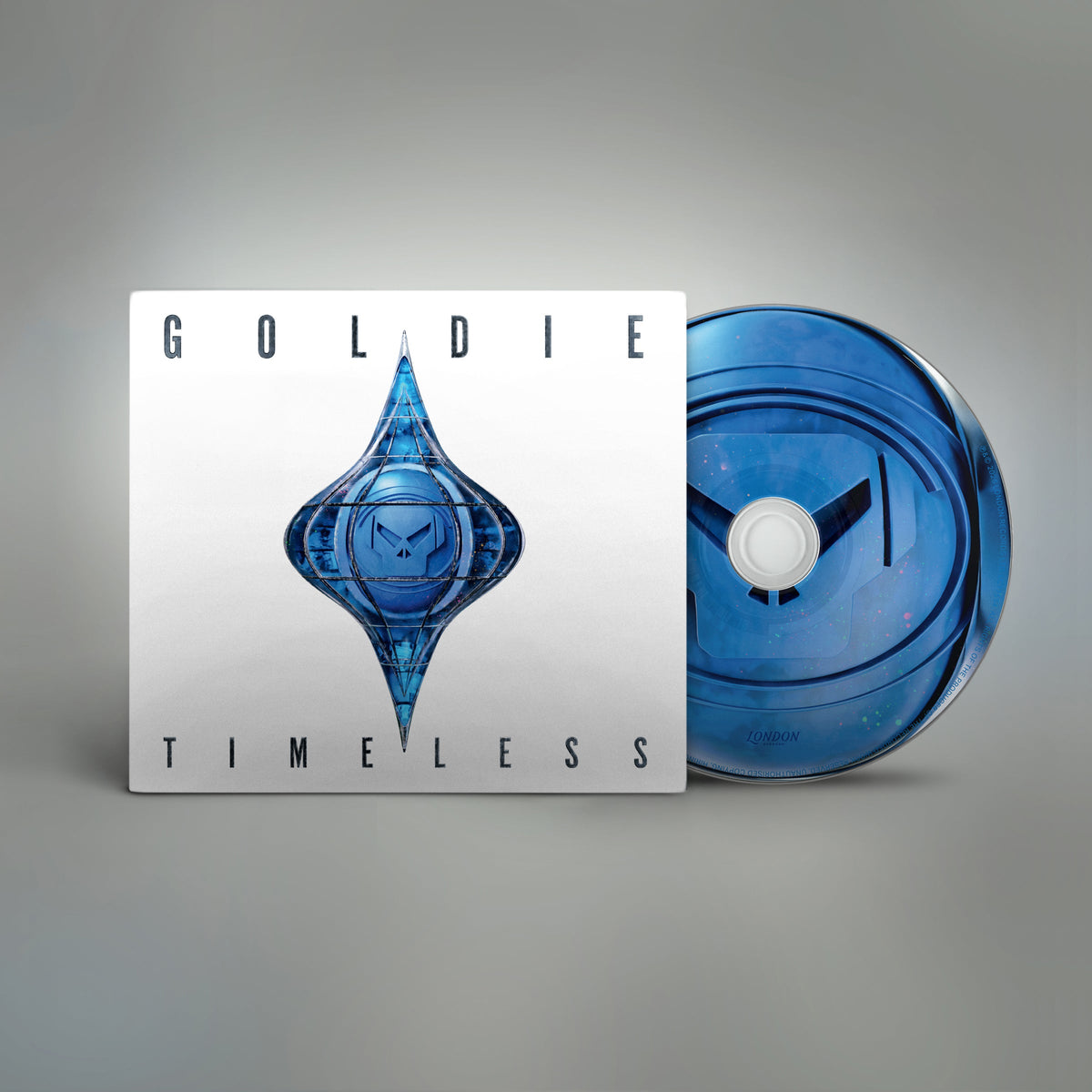 CD case and disc for Goldie’s “Timeless” album, blue and white design.