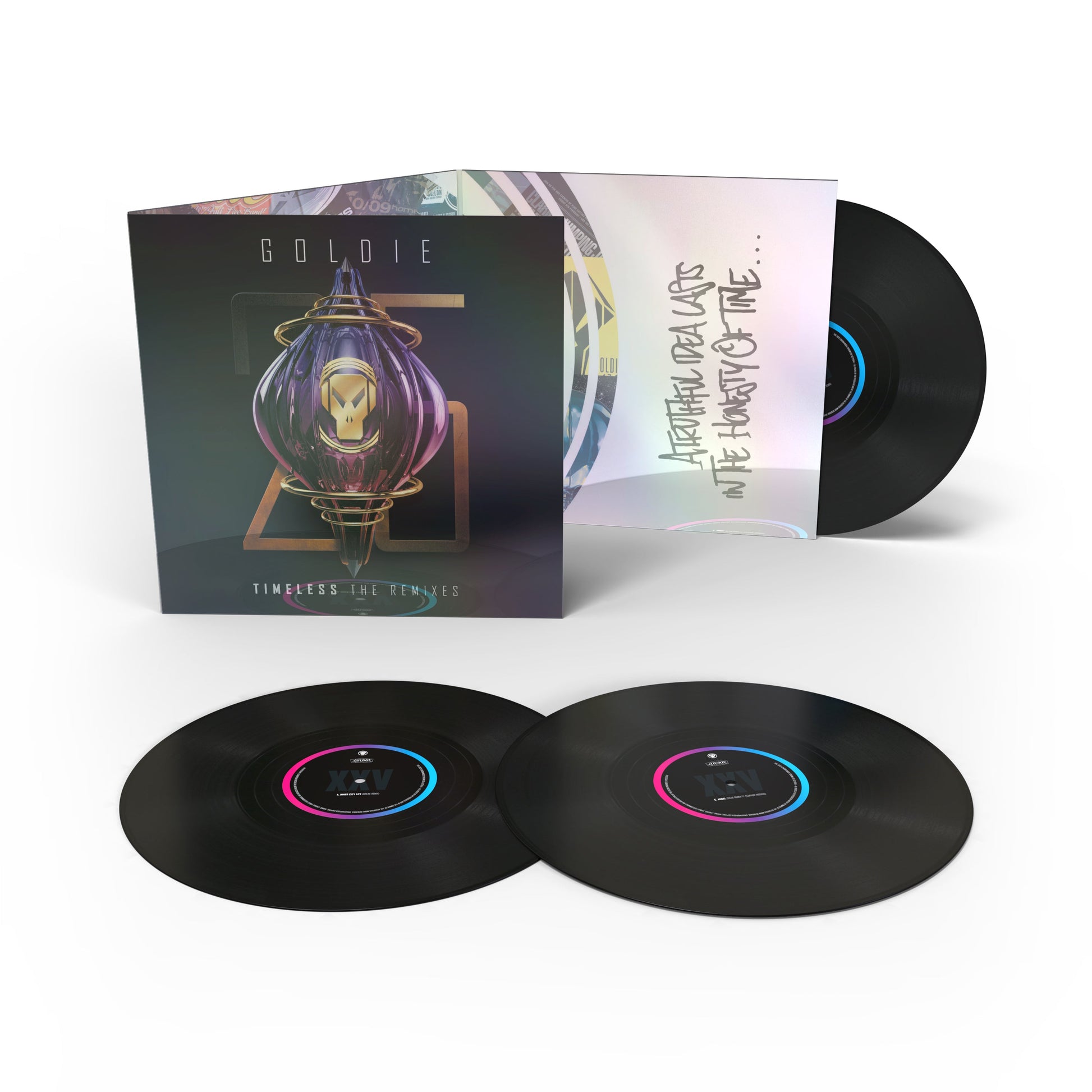 Goldie “Timeless (The Remixes)” 3LP vinyl record set with colorful labels.