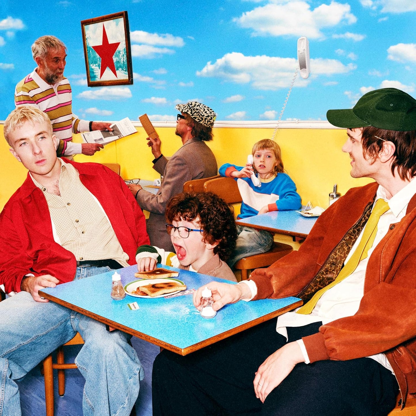 Group of people in a diner with a bright blue sky backdrop.