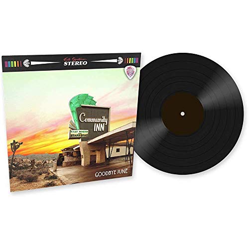 "Vibrant album cover featuring a motel sign with 'Community Inn' at sunset."