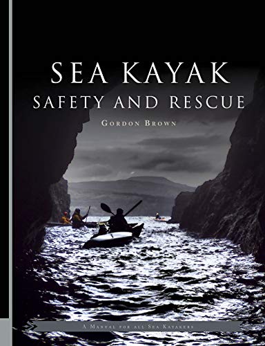Book cover showing sea kayakers paddling through a narrow rocky channel at sea.