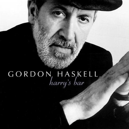 Black and white portrait of Gordon Haskell with hands clasped, album title Harry's Bar.