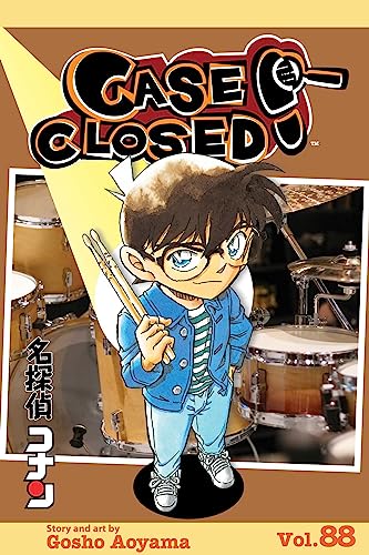 Manga cover for Case Closed Volume 88 featuring Conan Edogawa holding drumsticks in front drums.