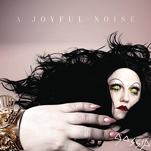 CD cover: pale face with dark hair, yellow eyes, and gold jewelry.