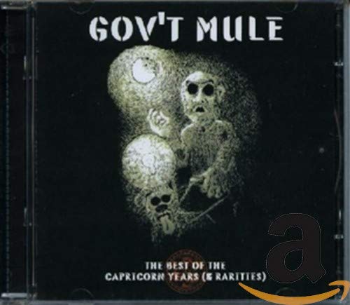 Gov’t Mule CD cover: dark image with three monkey sculptures.