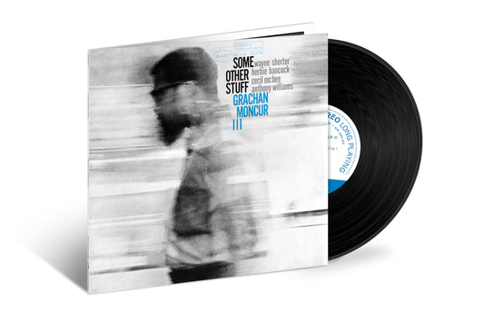 Vinyl record and album cover featuring a blurred portrait of Grachan Moncur III.