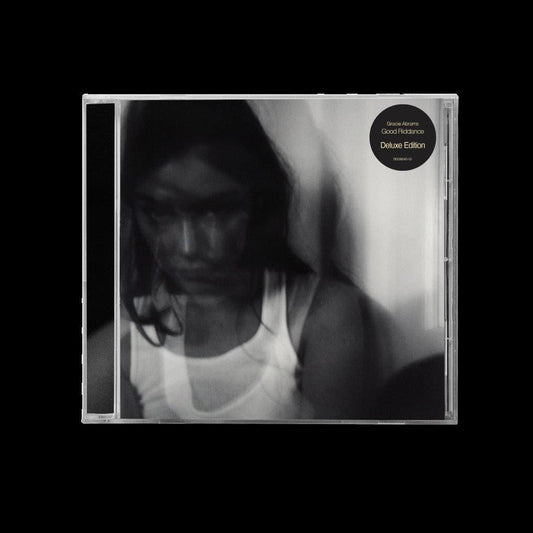 Gracie Abrams "Good Riddance (Deluxe)" CD case with blurred portrait.