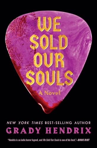 A purple guitar pick with gold text dripping blood against a black background.