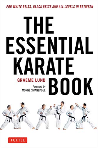 Karate book cover with white text and silhouettes of practitioners.