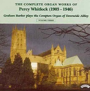 CD cover featuring Downside Abbey illuminated at dusk, with text details.