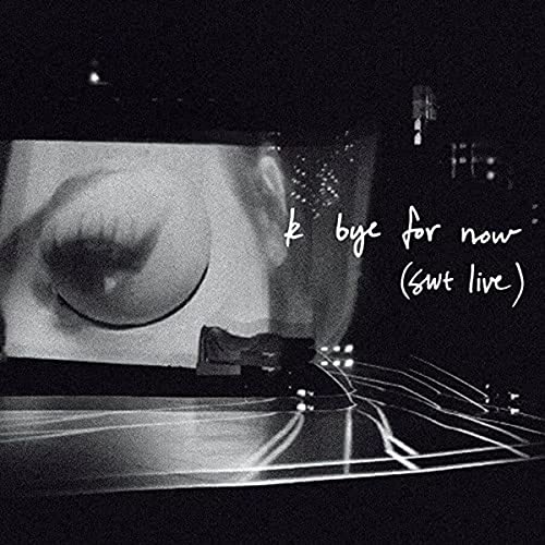 Black and white CD cover featuring an eye and handwritten text.