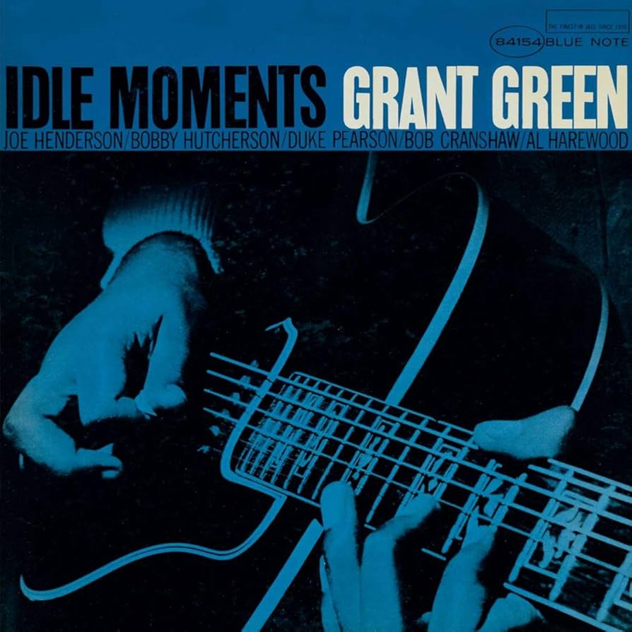 CD case for Grant Green’s “Idle Moments,” likely with blue cover art.