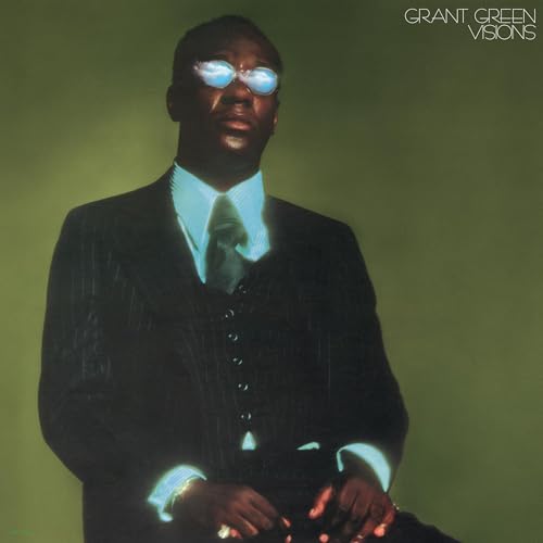 Grant Green album cover: portrait of a man in a suit and sunglasses.