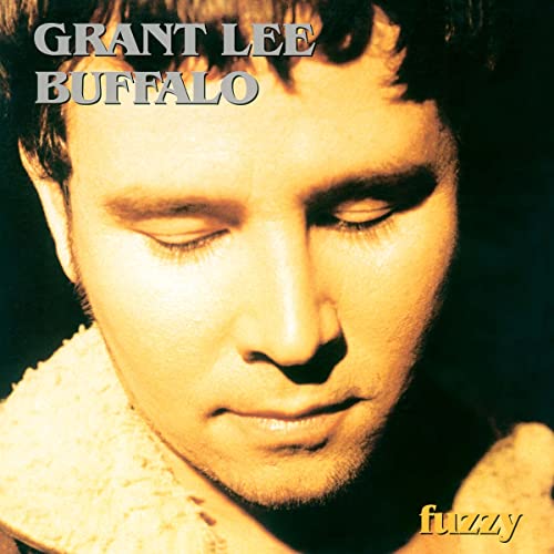 Album cover for Grant Lee Buffalo’s “Fuzzy” featuring a close-up portrait.