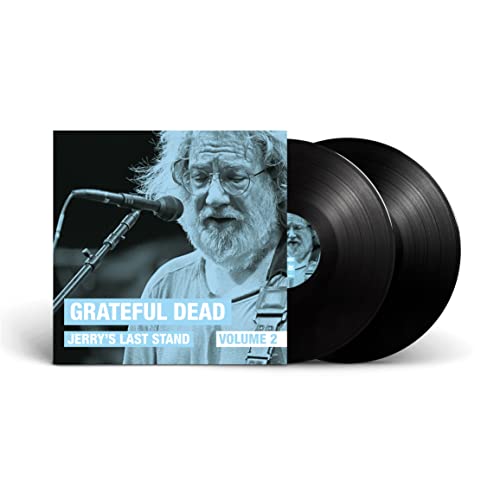 Grateful Dead vinyl record featuring Jerry Garcia’s portrait and two black discs.