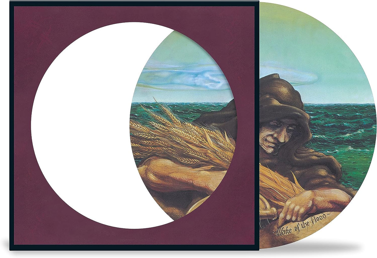 "Grateful Dead vinyl record with cover art of a man holding wheat."
