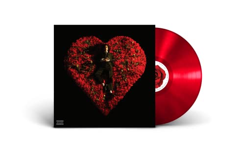 Red vinyl record with album cover featuring a person inside a rose heart.