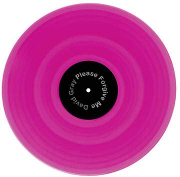 A pink vinyl record with a black label, featuring white text.