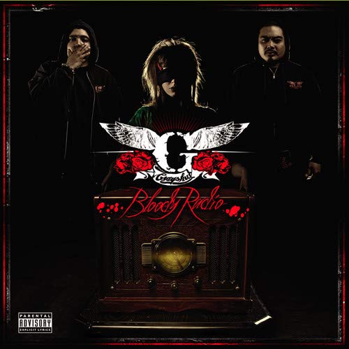 Grayskul album cover: three figures above an antique radio with roses.