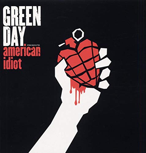"Green Day's 'American Idiot' album cover featuring a hand holding a grenade heart."