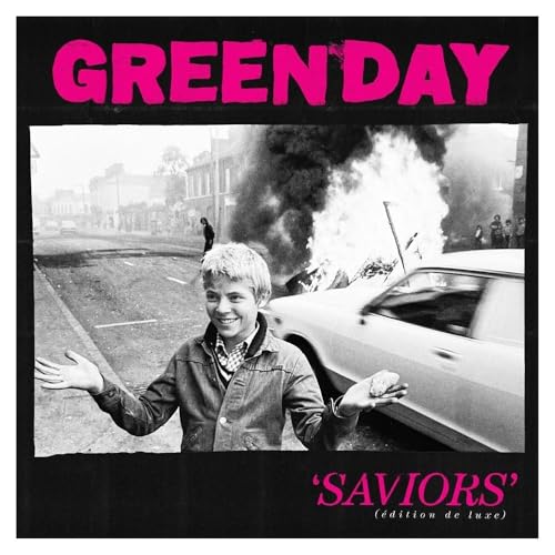 Green Day’s “Saviors” vinyl album cover with a boy in front of a burning car.