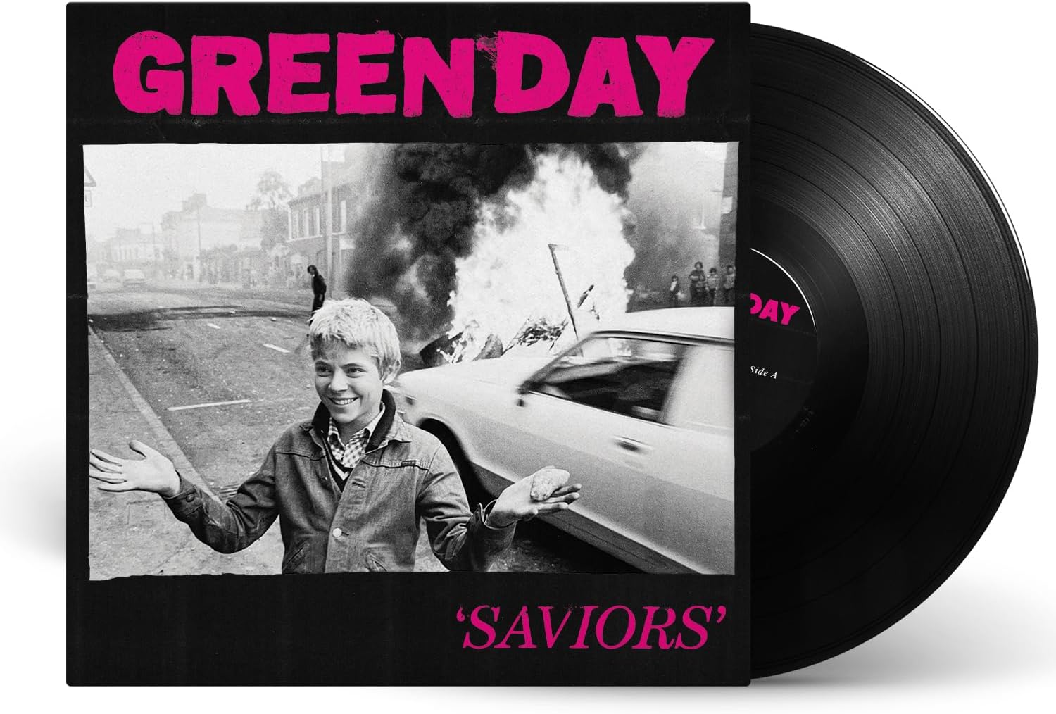 Green Day’s “Saviors” vinyl record with a black and white cover image.