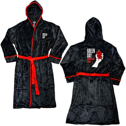 ManSSSman wearing a black plush bathrobe with red trim and Green Day logo.