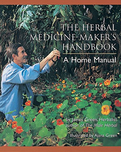 A man in a blue shirt gathers leaves in a garden of orange flowers.