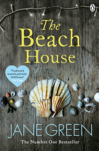 Book cover for "The Beach House" with seashells and string lights.