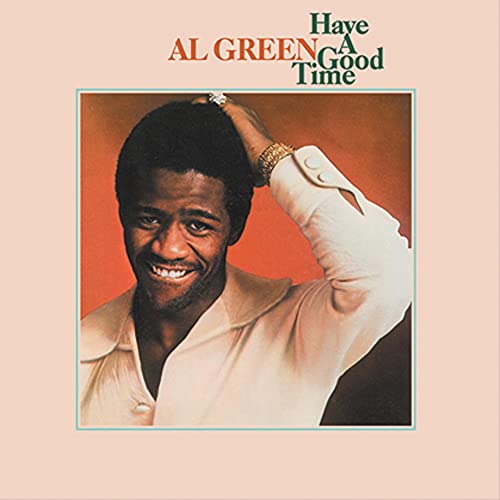 Al Green album cover: portrait of a smiling man in a white shirt.