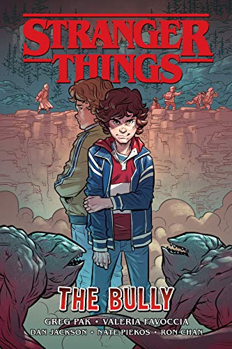 Graphic novel cover featuring two boys standing before monsters with the Stranger Things logo.