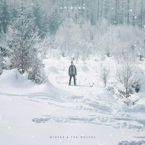 Album cover: man in snowy forest, titled "Winter & The Wolves".