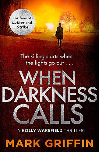 Book cover: a lone figure walks down a dark, fiery street.