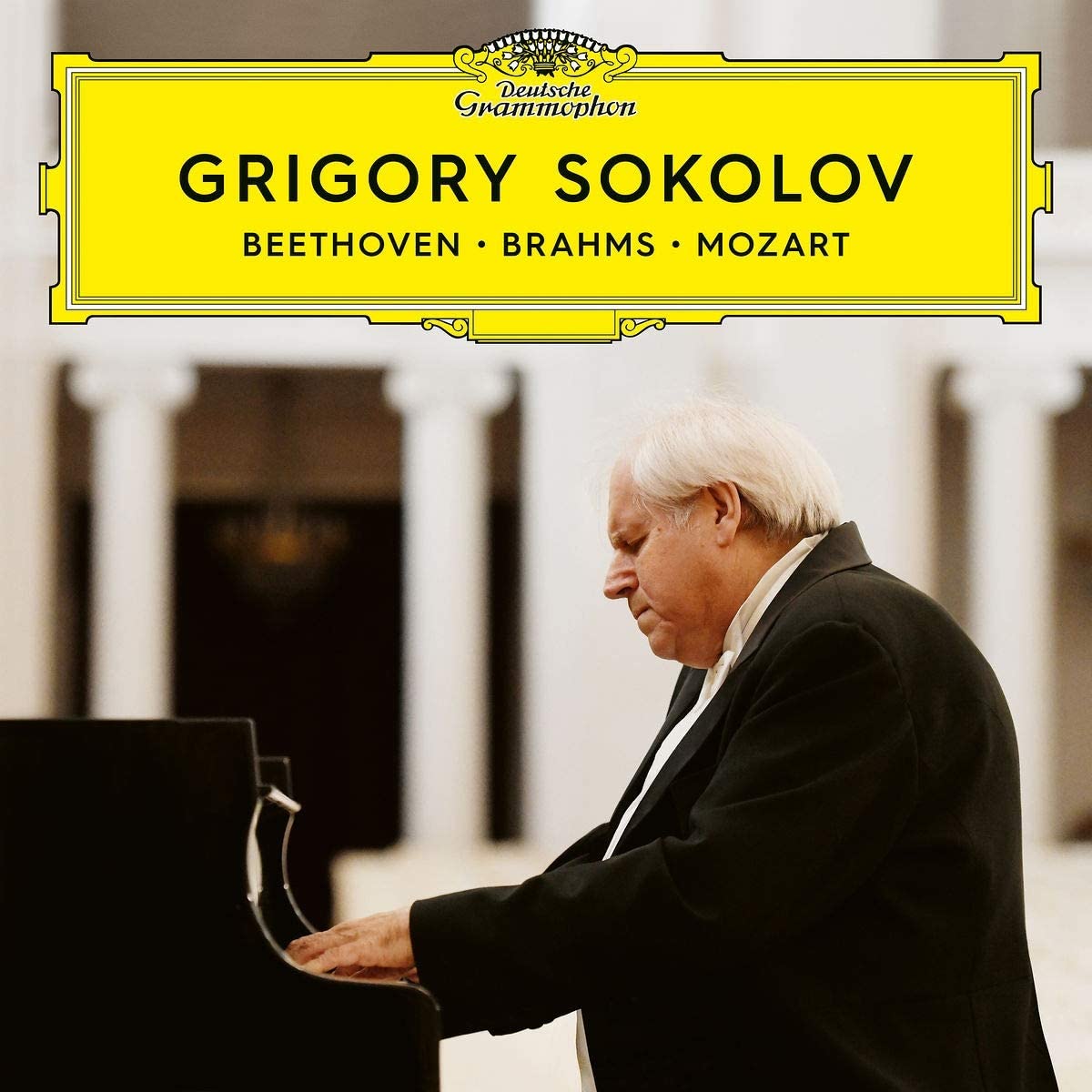 "CD cover featuring Grigory Sokolov playing piano, with yellow title banner above."