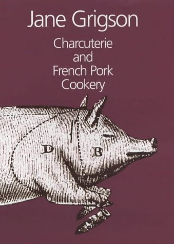 "Book cover with a pig illustration and title 'Charcuterie and French Pork Cookery' on maroon background."