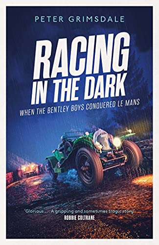 Book cover: vintage race car at night, title “Racing in the Dark.”