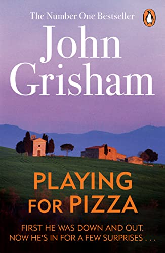 Book cover of Playing for Pizza by John Grisham featuring a Tuscan landscape.