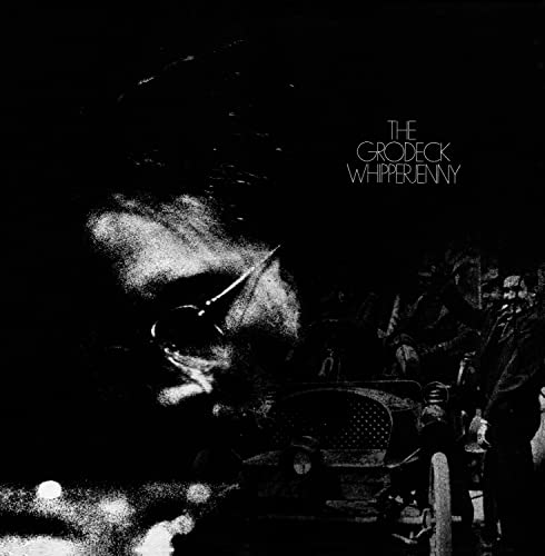 Black and white album cover with a blurry image of a car and people.