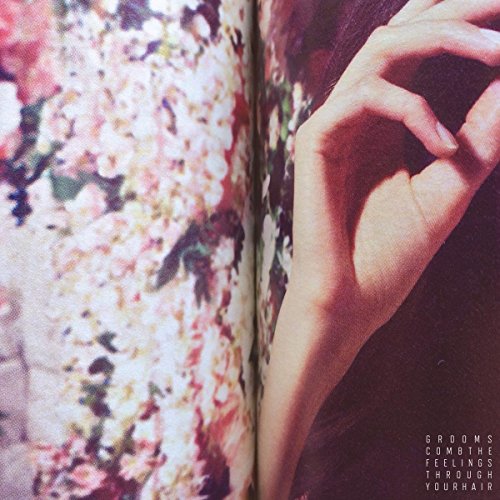 "CD cover with a hand and floral image, text reads 'Grooms Comb the Feelings Through Your Hair'."