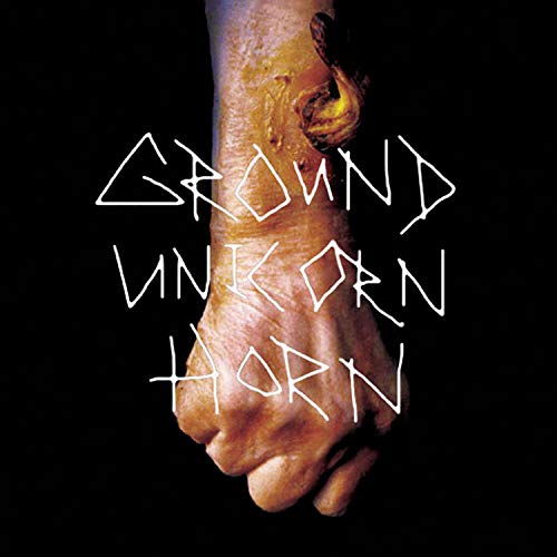 Clenched fist with bleeding wrist, text "Ground Unkorn Horn" on black background.