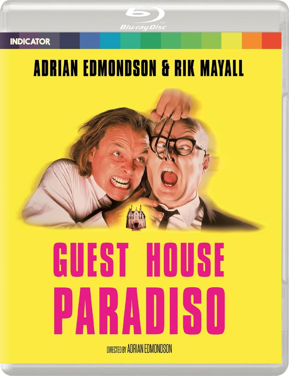 Blu-ray cover for "Guest House Paradiso" featuring two men and a castle.
